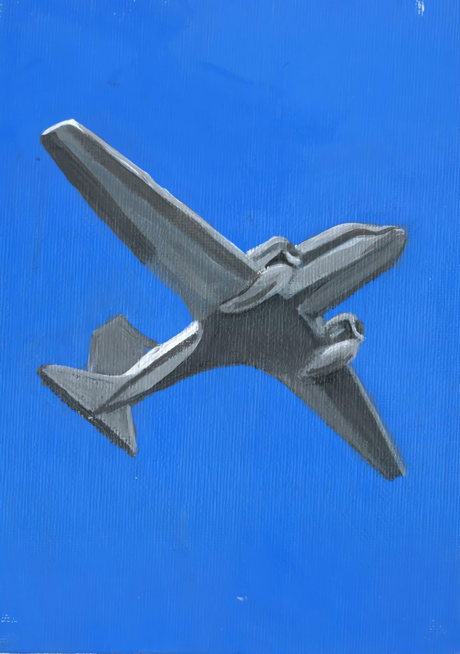 Airplane silhouette on blue sky background